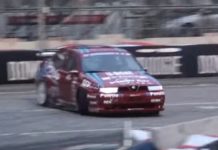 An Alfa Romeo 155 GTA drifting on the track An Alfa Romeo 155 GTA drifting on the track