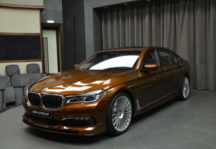 An Alpina B7 BiTurbo painted in brown with gold accents An Alpina B7 BiTurbo painted in brown with gold accents